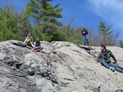 Group on rock slope
