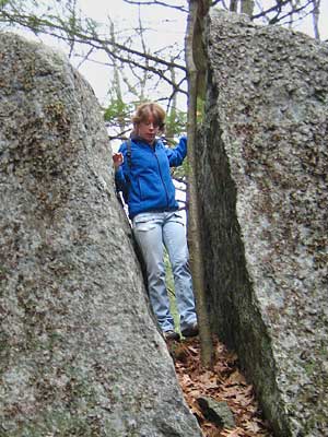 Hilary between boulders
