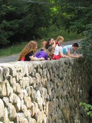 Group on stone bridge
