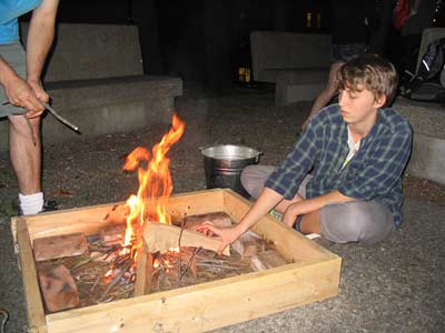 Hannah building the fire